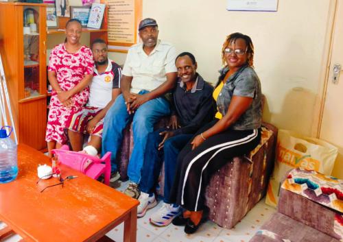 Visiting Mr Mwangura at Umoja after an accident.