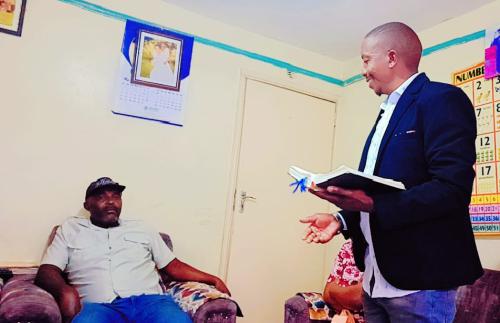 Visiting Mr Mwangura at Umoja after an accident.